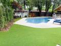 Tulsa Pool Landscaping with Artificial Grass, Composite Deck, &#038; River Rock
